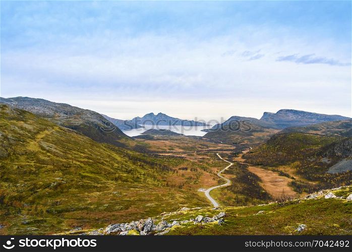 Beautiful mountain range landscape with cloudy sky, Tromso, Norway, selective focus