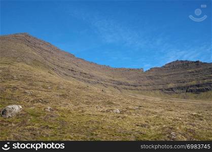Beautiful mountain scenery view to the majestic Villingardalsfjall Mountain on the Vi?oy the northern-most island of the Faroe Islands. Glorious sceneries of the Faroes.