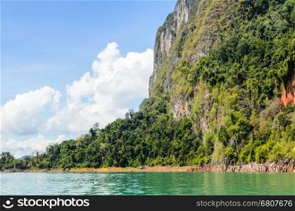 Beautiful mountain surrounded by water, Natural attractions at Ratchapapha dam in Khao Sok National Park, Surat Thani province, Guilin of Thailand.