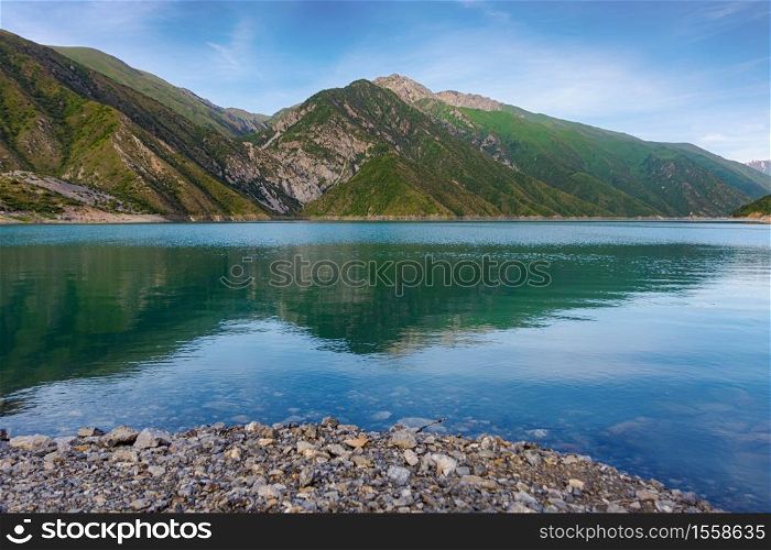 Beautiful mountain turquoise color lake Karasuu in Tian-Shan, Kyrgyzstan.. Beautiful mountain turquoise color lake Karasuu. Kyrgyzstan.