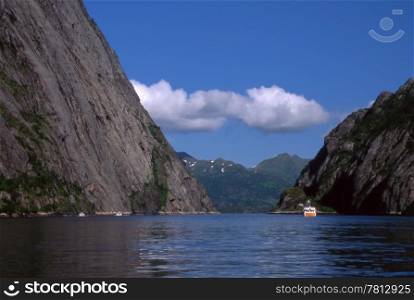 Beautiful Mountains and sea in norway with blue sky