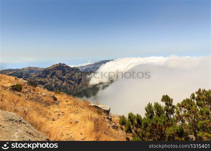 Beautiful mountains in the clouds landscape, Portugal, Madeira. Beautiful mountains in clouds