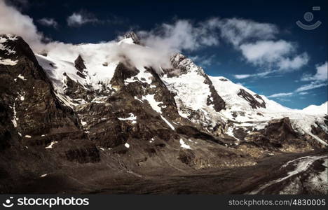 Beautiful mountains landscape, wintertime season, Alpine mountain covered with snow, travel and tourism, winter holiday concept