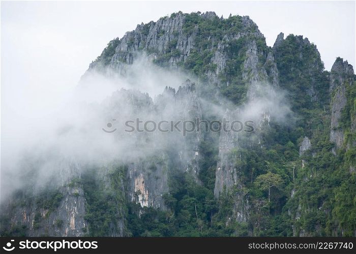 Beautiful mountains with gently mist, hard and tender. Scenery tropical mountains. Vang Vieng, Northern Laos.