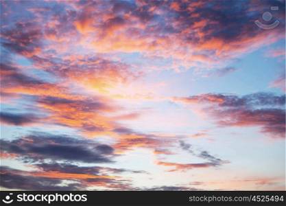 Beautiful multicolored sunset sky with clouds, natural background