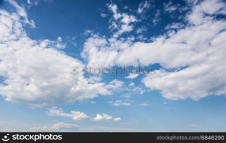 Beautiful natural background: blue sky with white clouds