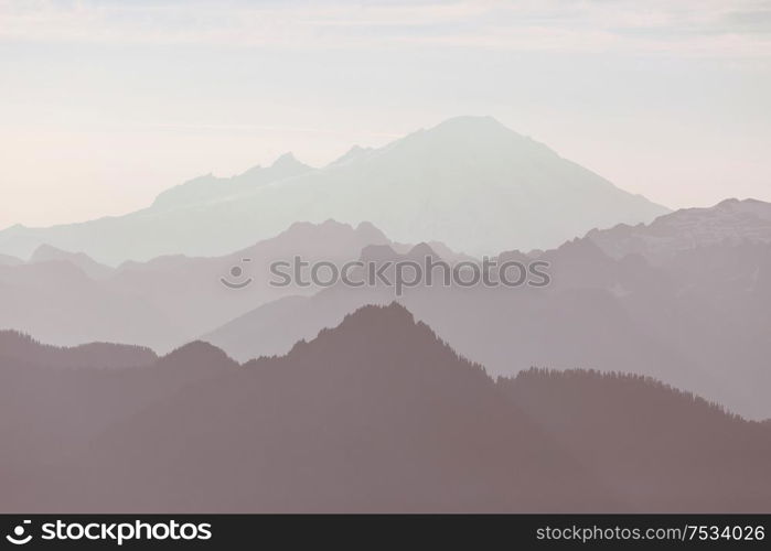 Beautiful natural background. Mountain silhouette at the sunset.