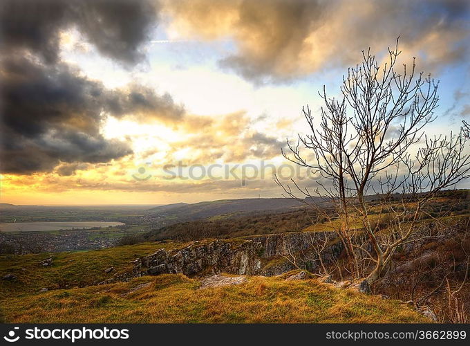 Beautiful natural landscape over limestone cliffs with bright colors and dramatic sky