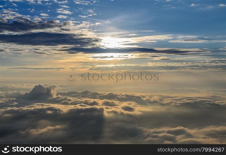 Beautiful nature landscape of rising sun in the early morning over sea of mist