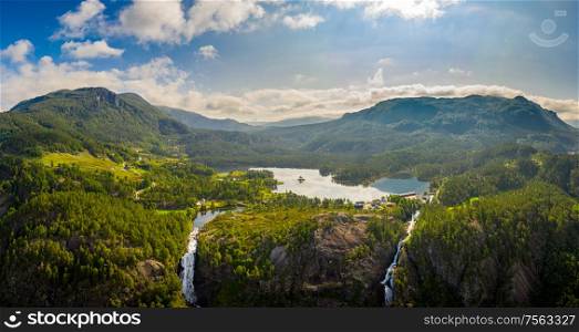 Beautiful Nature Norway natural landscape. Panorama Latefossen Waterfall Odda Norway. Latefoss is a powerful, twin waterfall.