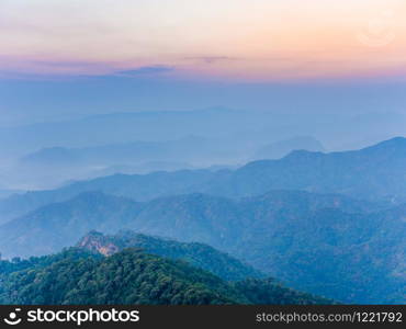 beautiful nature of hills and complex mountain with the morning mist atmosphere in Tak, Thailand.