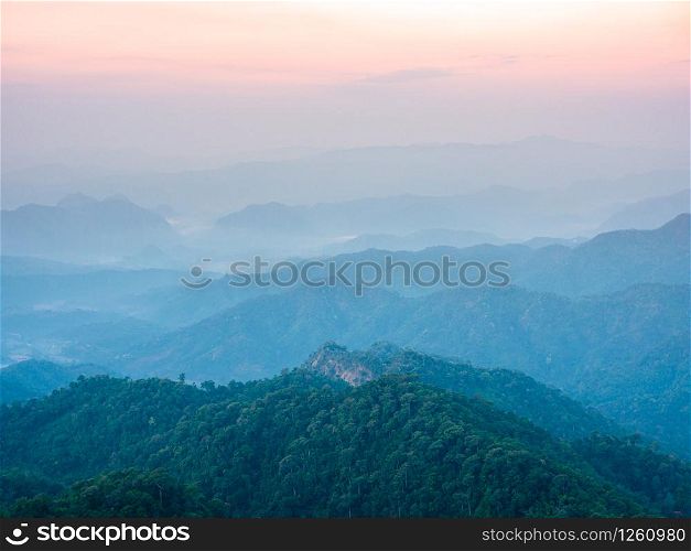 beautiful nature of hills and complex mountain with the morning mist atmosphere in Tak, Thailand.