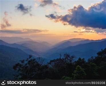 beautiful nature of hills and mountain are complex with the atmosphere of the morning sunrise, at Mae Wong National park, K&haeng Phet, Thailand.