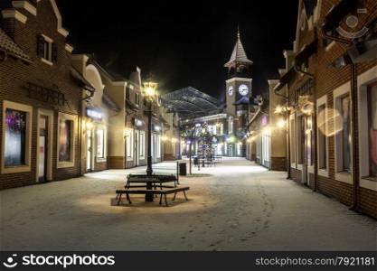Beautiful night landscape of winter street with tower clock