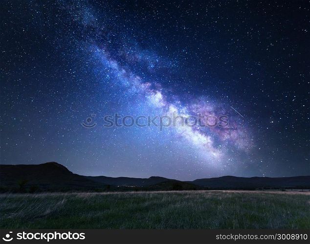 Beautiful night sky with the full moon and stars. Landscape with blue Milky Way. Night sky with stars at mountains, Universe, beautiful mountain valley