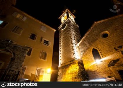 Beautiful night view of ancient stone tower in Montenegro