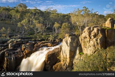 Beautiful Nigretta Falls waterfall in Western Victoria, Australia with high flow during winter time in time-lapse