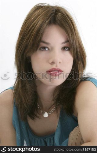 Beautiful nineteen year old with gorgeous lips. Shot in studio over white.