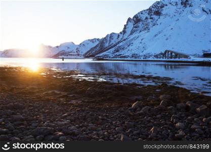beautiful Norwegian landscape at the Lofoten Islands. Norway. sunset on the shore of the fjord