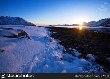 beautiful Norwegian landscape at the Lofoten Islands. Norway. sunset on the shore of the fjord