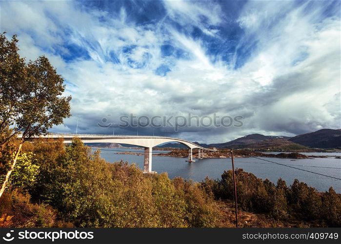 beautiful Norwegian landscape. bridge against a beautiful blue sky with clouds