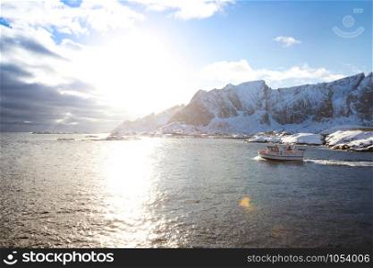 beautiful Norwegian landscape in winter. fishing boat. Lofoten Islands. Norway.