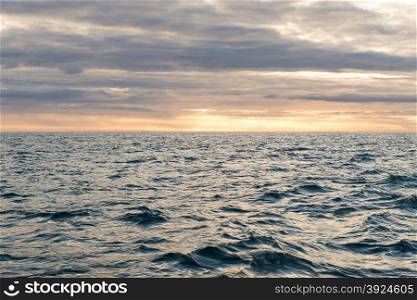 Beautiful ocean landscape. Beautiful ocean landscape in the arctic with an intense cloud pattern and sun light