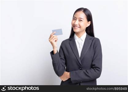 Beautiful of Asian business women standing holding with blank card and smiling, Copy space, isolated on white background.