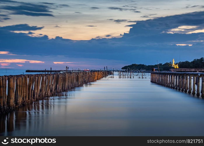 Beautiful of The walkway bridge in evening at Bang Khun Thian sea view, Bang Khun Thian, Bangkok, Thailand.