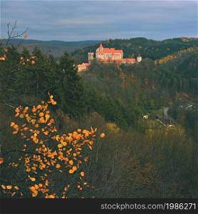 Beautiful old castle in forests with autumn landscape. Castle Pernstejn - Nedvedice. Europe Czech Republic.