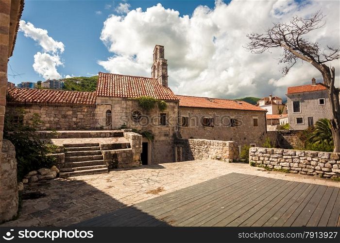 Beautiful old stone cathedral at ancient citadel in city of Budva, Montenegro