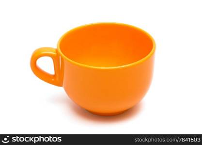 Beautiful orange cup on a white background