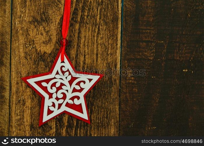 Beautiful ornates for Christmas on a wooden rustic background