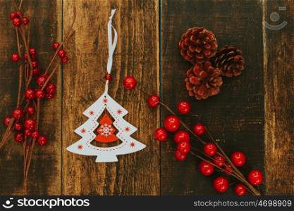Beautiful ornates for Christmas on a wooden rustic background