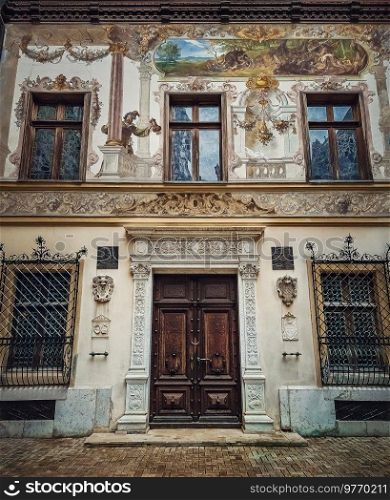 Beautiful painted walls and facade details of the Peles castle the royal residence in Sinaia, Romania