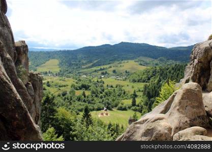 beautiful panorama in Carpathian mountains with forest