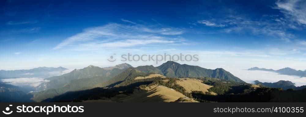 Beautiful panorama mountain landscape with blue sky.