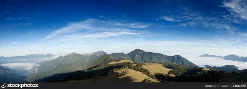 Beautiful panorama mountain landscape with blue sky.