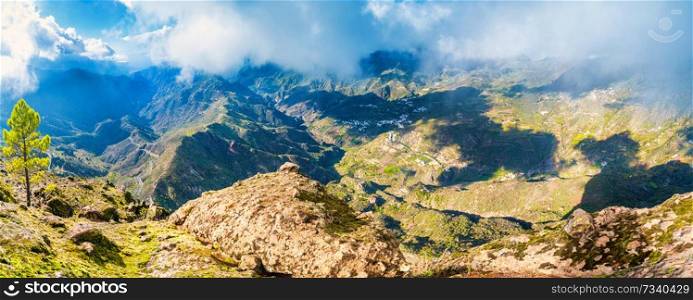 Beautiful panorama of Canary Island - landscape with green hills and mountain village. View from above