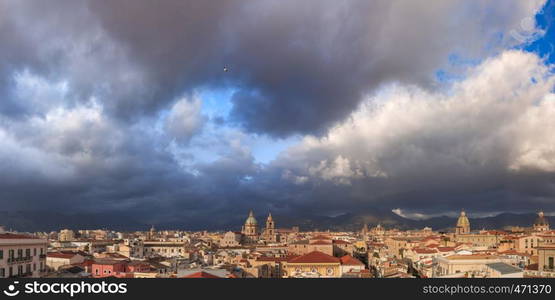 Beautiful panoramic aerial view of Palermo with Church of the Gesu, Palermo cathedral and Carmine church at thunder dawn, Sicily, Italy. Palermo at sunset, Sicily, Italy