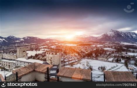 Beautiful panoramic shot of sunset over the snowy Alps next to Salzburg