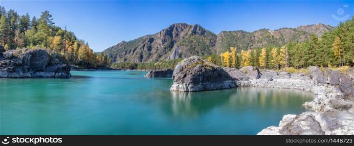 Beautiful panoramic view of a small cove on the Katun river in Altai mountains, Siberia, Russia. Fall 2019