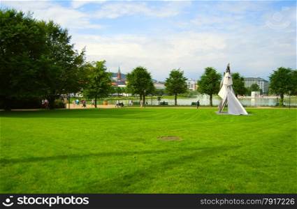 Beautiful park with a modern statue and famous fontain