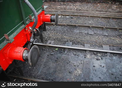 beautiful part of a old antique steam train on the railway