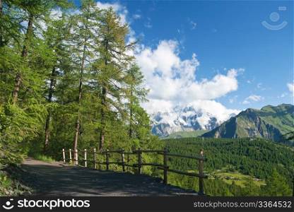 beautiful path in Italian Alps with mont Blanc on background