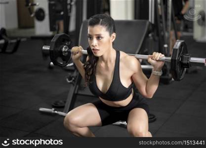 Beautiful perfect body woman is work out in the gym