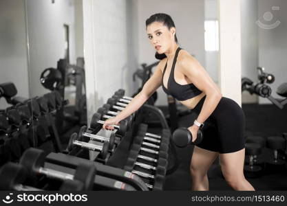 Beautiful perfect body woman is work out in the gym