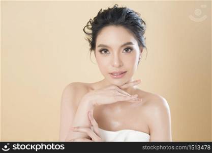 Beautiful perfect skin gorgeous young woman portrait in studio