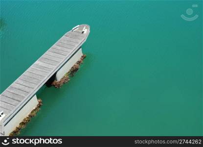 beautiful photo of a green water dock (landing stage)