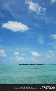 beautiful photo of a maldivian island with a great waterview and cloudscape